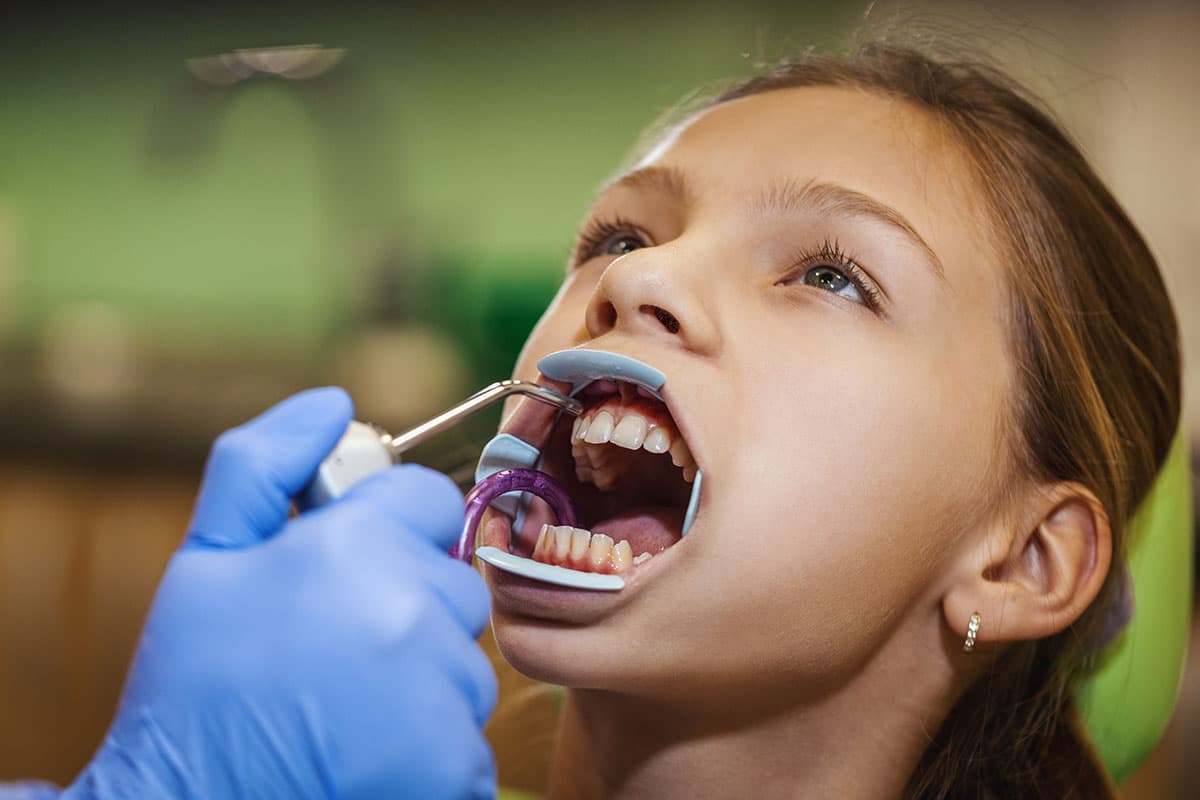 woman receiving dental bonding treatment