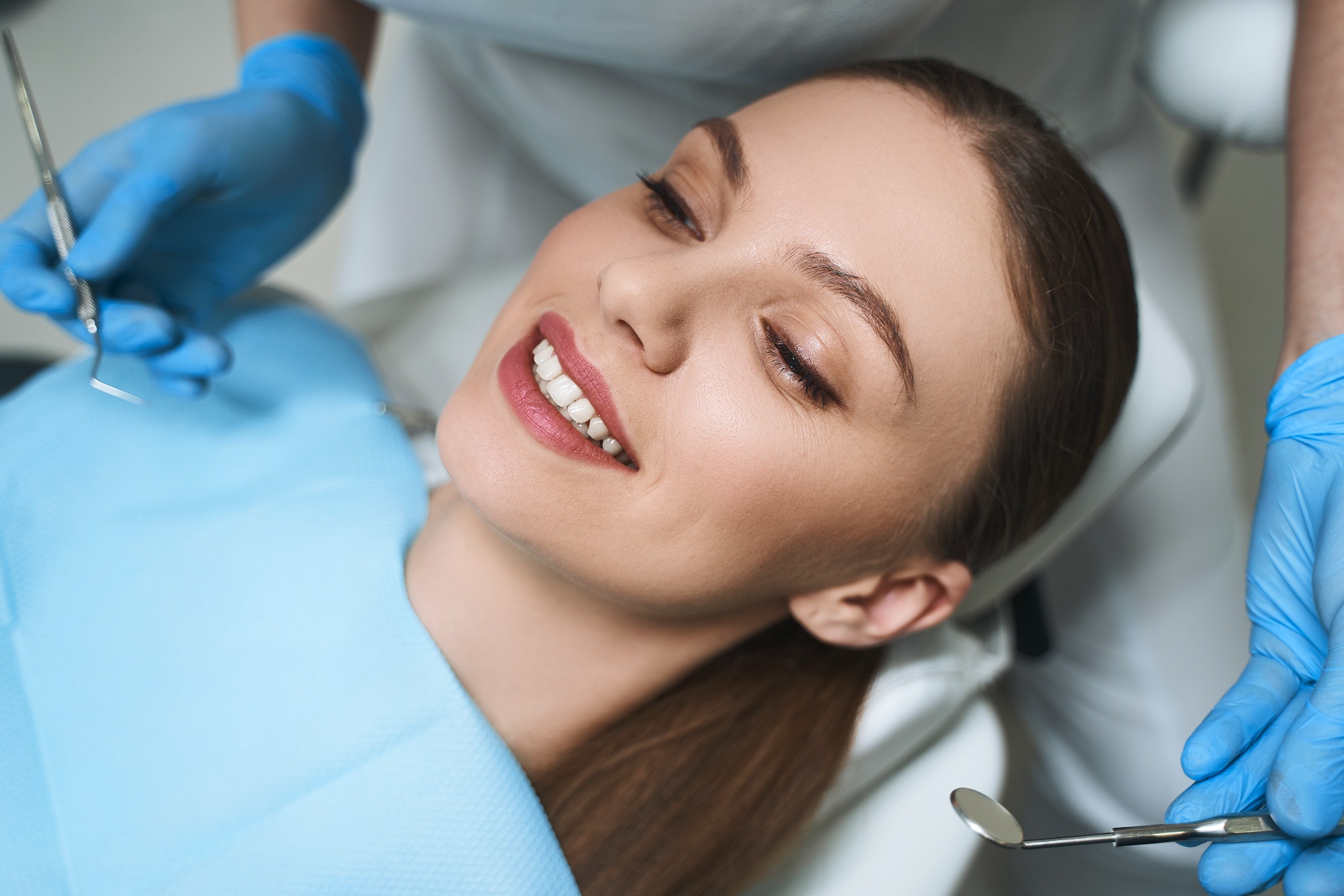 Smiling woman in dental chair stock photo